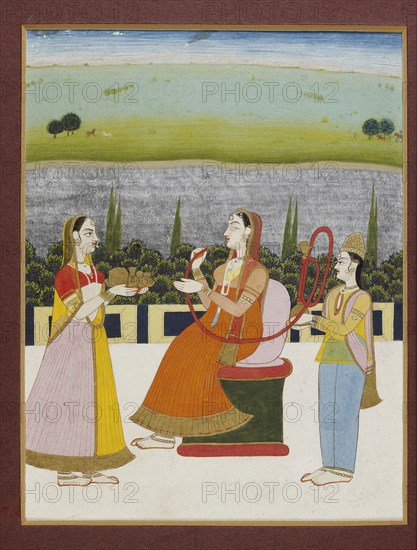 A lady seated smoking on a terrace, with two attendants, 19th century (1801-1900). Artist: Unknown.