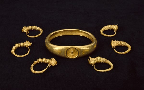 Gold earrings and gold armlet, fom a temple treasure, 4th-3rd century BC. Artist: Unknown.