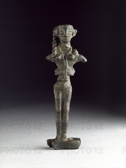 Copper figurine of Astarte on an ingot, Late Bronze Age, c1200-1100BC. Artist: Unknown.