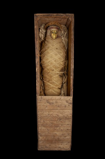 Ptolemaic coffin, mummy with gilt mask and floral garlands, Roman Period (Egypt), c30BC-AD641. Artist: Unknown.