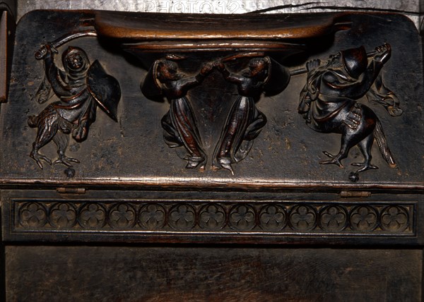 Detail of the choir ashlar work of the Cathedral of Barcelona, made in oak wood, 'Reliefs of Mercy'.