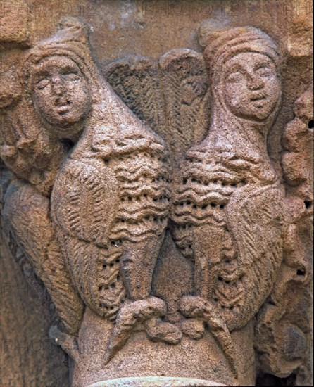 Capital decorated with antrozoomorphic figures outside the north gallery of the cloister of the M?