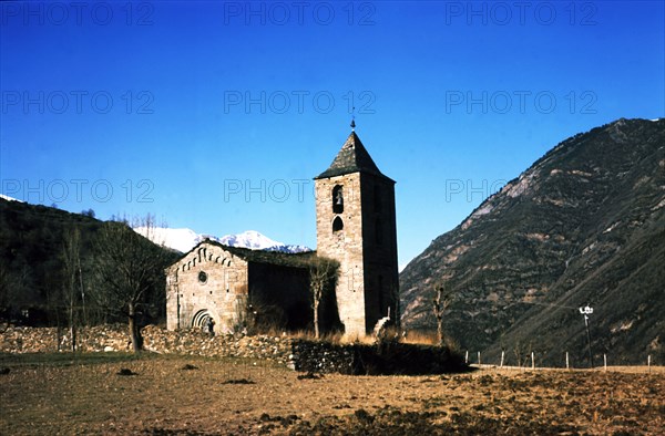 View of the Church of the Assumption in the village Coll de Tor built with large stone blocks.