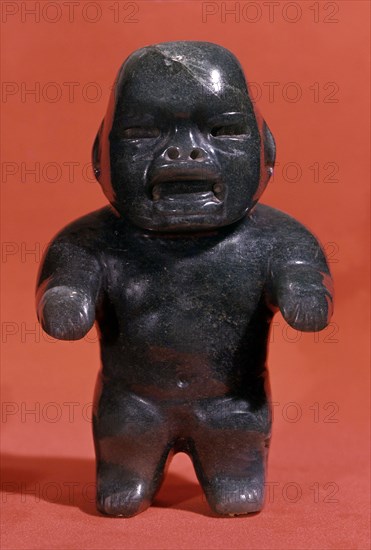 Jade figurine, probably a child although the Olmecs used to represent adults with childlike featu?