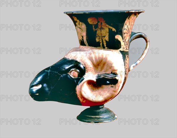 Greek Rhyton ram head shaped.