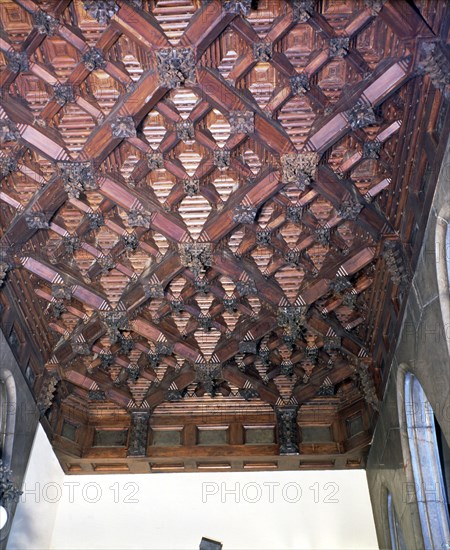 Wood coffered ceiling in one of the upstairs ceilings of the Güell Palace, built between 1886 and?