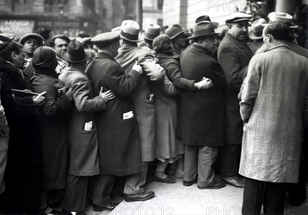 Group of people standing in line to visit the funeral chapel of Francesc Macia, president of the ?