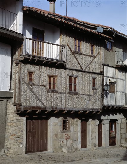 Street of La Alberca (Salamanca), and a house façade.