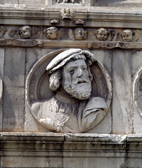 Medallion in stone on the facade of the old Hospital of San Marcos representing King Charles I of?