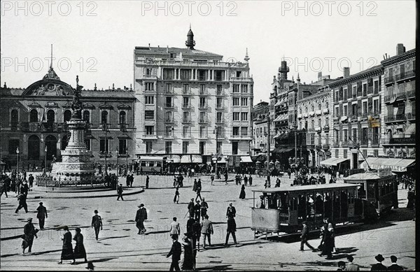 Electric Tram with trailer load circulating through the Plaza of the Constitution of Zaragoza (Ar?
