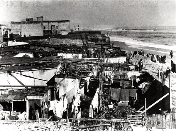 Barracks built on the Somorrostro beach in the Barceloneta in Barcelona, 1950s.