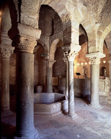 Baptistery of San Miguel de Egara in Terrassa, interior view with columns arranged around the font.