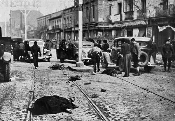 Spanish Civil War 1936-39. Madrid, an Avenue at the north of the city, moments after an air raid,?