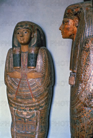 Sarcophagi in painted wood.