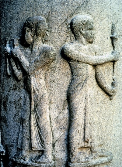 Relief of a priest in a granite column, now in the Capitoline Museum in Rome.