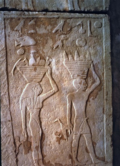 Detail of the reliefs of the back door in the tomb of Princess Tjentet, from Gizeh.