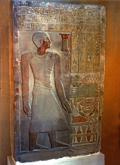 Stela of the Senouret, chief of the royal treasury, with his image and hieroglyphic writing, made?