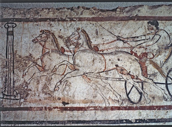 Fresco from a Lucan tomb in Paestum depicting a man in a carriage drawn by two horses.