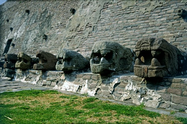 Tenayuca Pyramid, Aztec construction, the below part of the wall has snake heads surrounding the ?