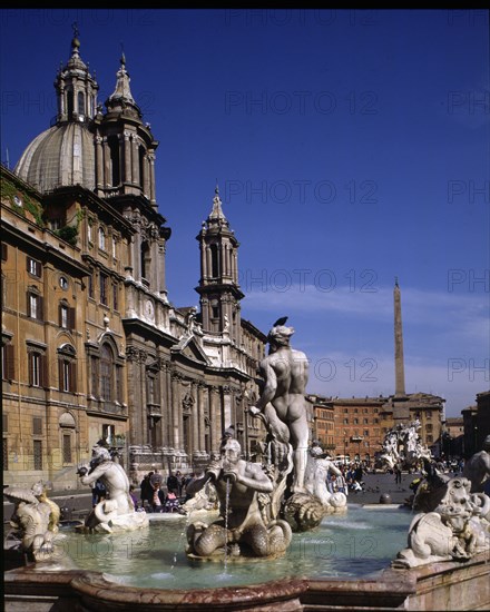 Detail of the Fountain of the Rivers and the Church of St. Agnes, both are Baroque style.