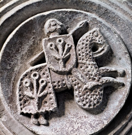 The Coat of arms of Cardona family, a capital in the cloister of the Monastery of Santa Maria de ?