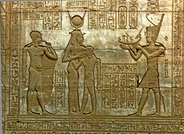 Reliefs with figures and writing in the Temple of Hathor.