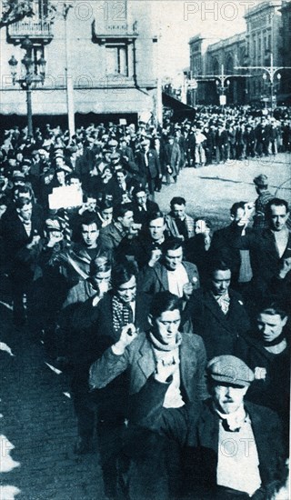 Spanish Civil War, 1936-39. Foreigner volunteers upon arrival to Barcelona to fight alongside the?