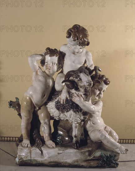 Three children with a goat, porcelain from the Buen Retiro.