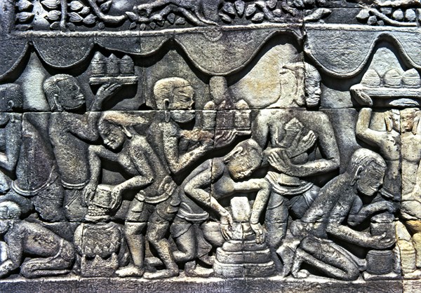 Relief showing an everyday scene in the temples of Angkor Thom in Cambodia.