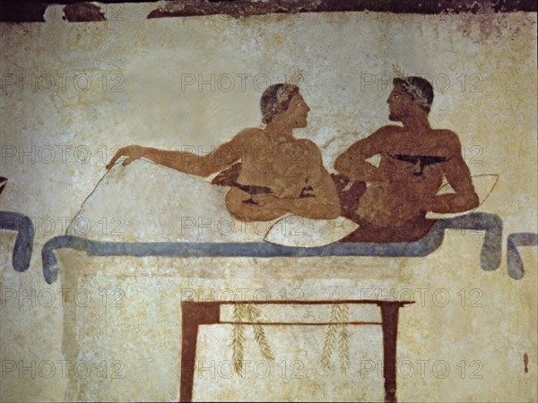 Banquet in which a deceased participates. Detail of a painting in the Jumper Tomb at Paestum.