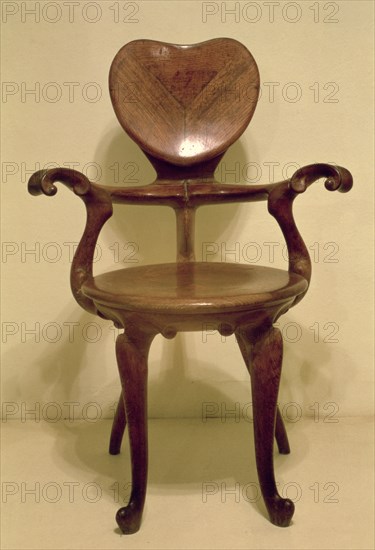 Chair with arms of the desk of the commercial office Calvet House, 1904, designed by Antoni Gaudi.