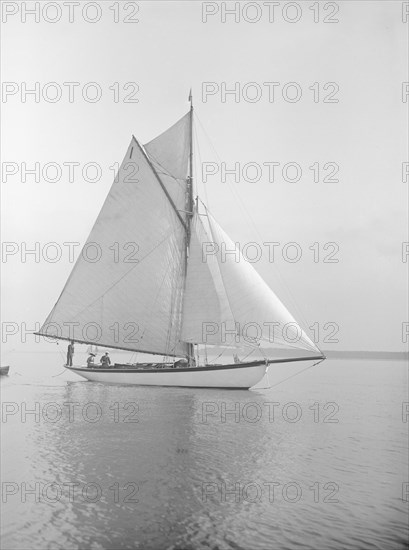 The cutter 'Wenda' in light winds, 1912. Creator: Kirk & Sons of Cowes.