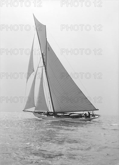 The cutter 'Westwind' sailing close-hauled, 1914. Creator: Kirk & Sons of Cowes.