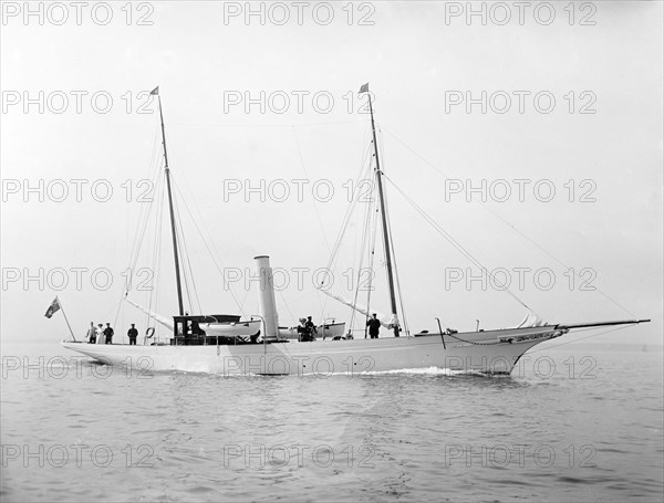 The steam yacht 'Amazon' under way. Creator: Kirk & Sons of Cowes.