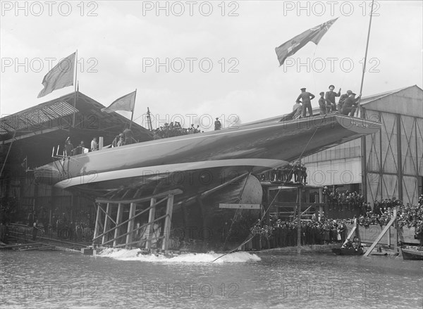 The launch of 'Shamrock IV' at Gosport, May 1914. Creator: Kirk & Sons of Cowes.