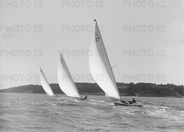 The 6 Metre class 'Lanka', 'Wamba' and 'Stella' racing on reaching leg, 1914. Creator: Kirk & Sons of Cowes.