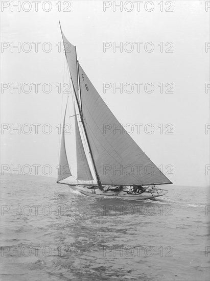 The 10 Metre class 'Pampero' (F8) sailing close-hauled, 1914. Creator: Kirk & Sons of Cowes.
