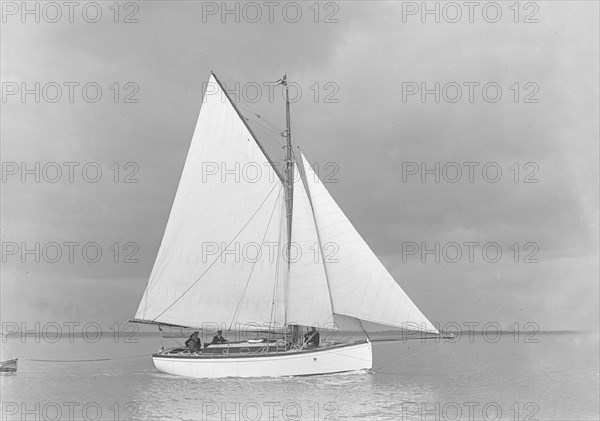 The gaff rig sailboat 'Bunty', 1921. Creator: Kirk & Sons of Cowes.