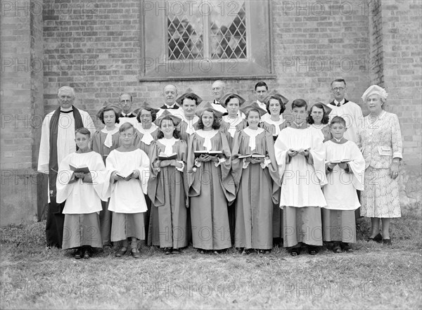 Church officials and choir, (Isle of Wight?), c1935. Creator: Kirk & Sons of Cowes.