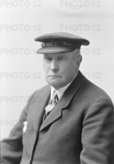 Portrait of an elderly man in a uniform, (Isle of Wight?), c1935. Creator: Kirk & Sons of Cowes.