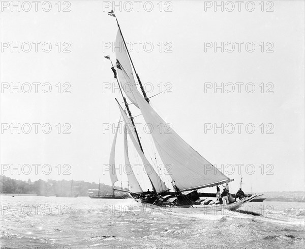 The schooner 'Flying Foam' sailing close-hauled in a good wind, 1910.  Creator: Kirk & Sons of Cowes.