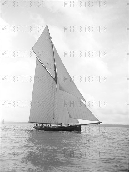 The gaff rigged cutter 'Bloodhound' sailing close-hauled, August 1911. Creator: Kirk & Sons of Cowes.