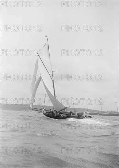 The gaff rigged cutter 'Bloodhound' sailing on a broad reach, August 1912. Creator: Kirk & Sons of Cowes.