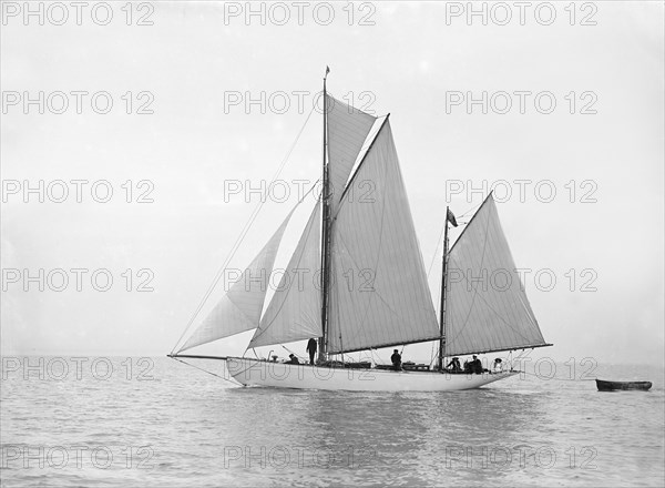 The yawl 'Meander' sailing in close-hauled, 1913. Creator: Kirk & Sons of Cowes.