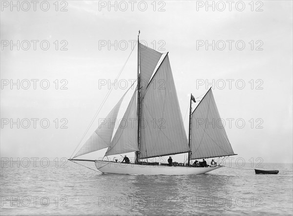 The yawl 'Meander' sailing in close-hauled, 1913. Creator: Kirk & Sons of Cowes.