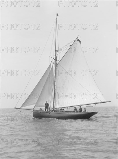 The gaff rigged cutter 'Wych' under sail, 1914. Creator: Kirk & Sons of Cowes.