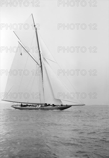 The beautiful 52 ft cutter 'Sonya' sailing close-hauled, 1913. Creator: Kirk & Sons of Cowes.