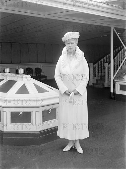 Queen Mary aboard 'HMY Victoria and Albert', 1933. Creator: Kirk & Sons of Cowes.