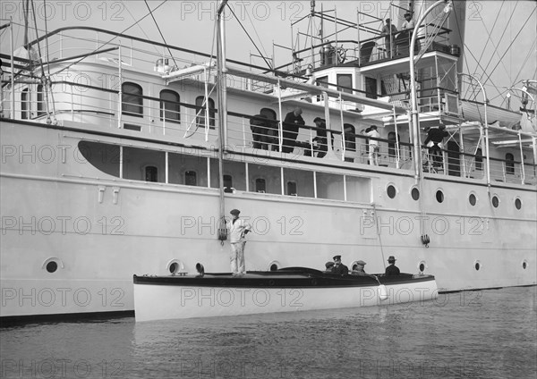 Liberty's motor launch alongside 'Liberty', 1914. Creator: Kirk & Sons of Cowes.