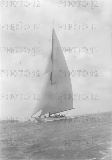 The 23-metre cutter 'Astra' sailing close-hauled, 1933. Creator: Kirk & Sons of Cowes.